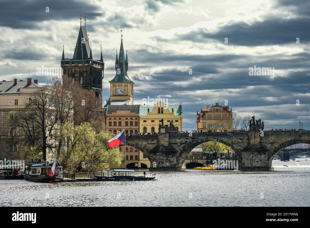 Sightseeing, boat trip, statues, church, flag, Charles Bridge Prague, Prague, Czech Republic Stock Photo