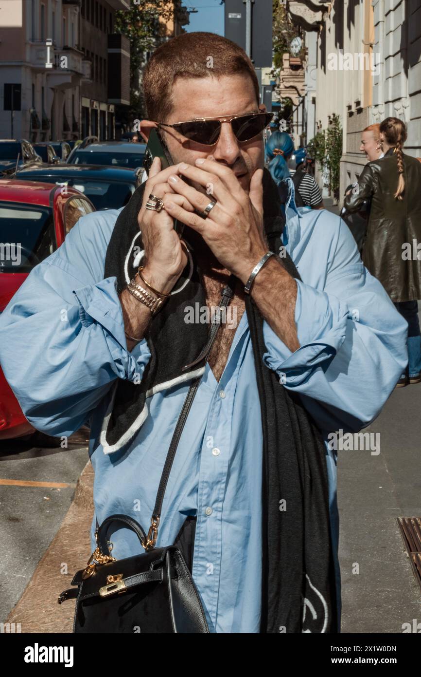A guest outside Karoline Vitto show supported by Dolce & Gabbana during