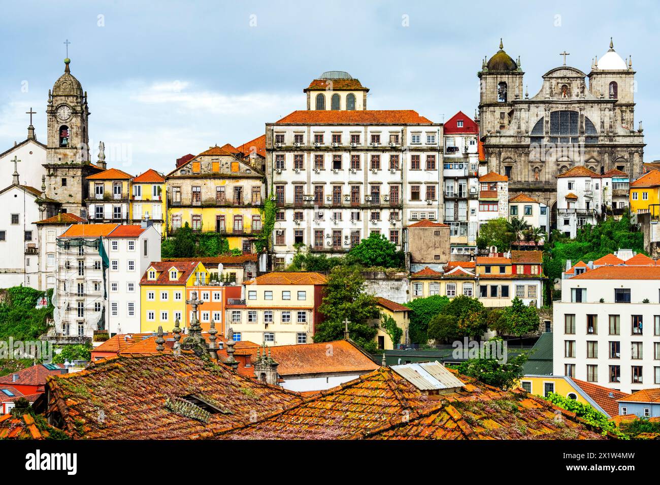 Colorful cityscape of Porto historic centre with rooftops and the tower of the Clerigos. Portugal. Stock Photo
