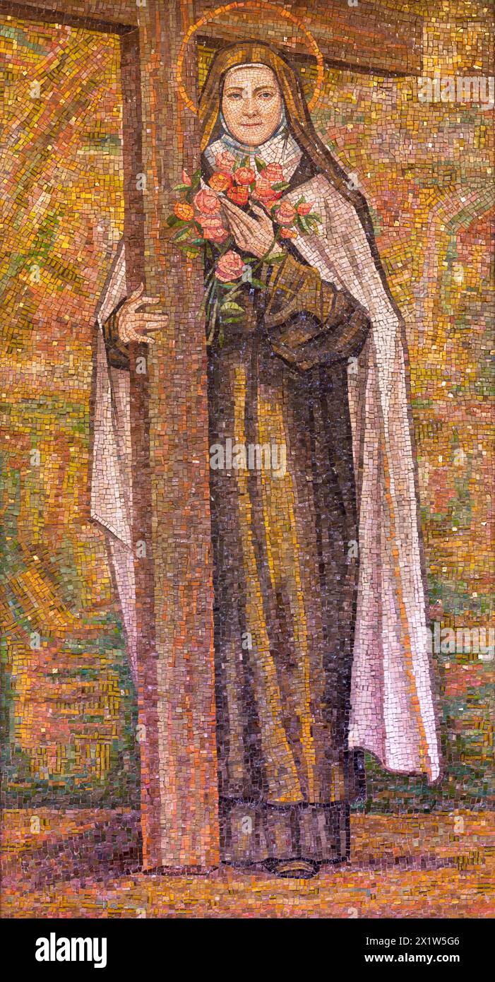 MILAN, ITALY - MARCH 8, 2024: The mosaic of Therese of Lisieux in the church Chiesa di Santi Quattro Evangelisti by Italo Persson and Silvio Consadori Stock Photo