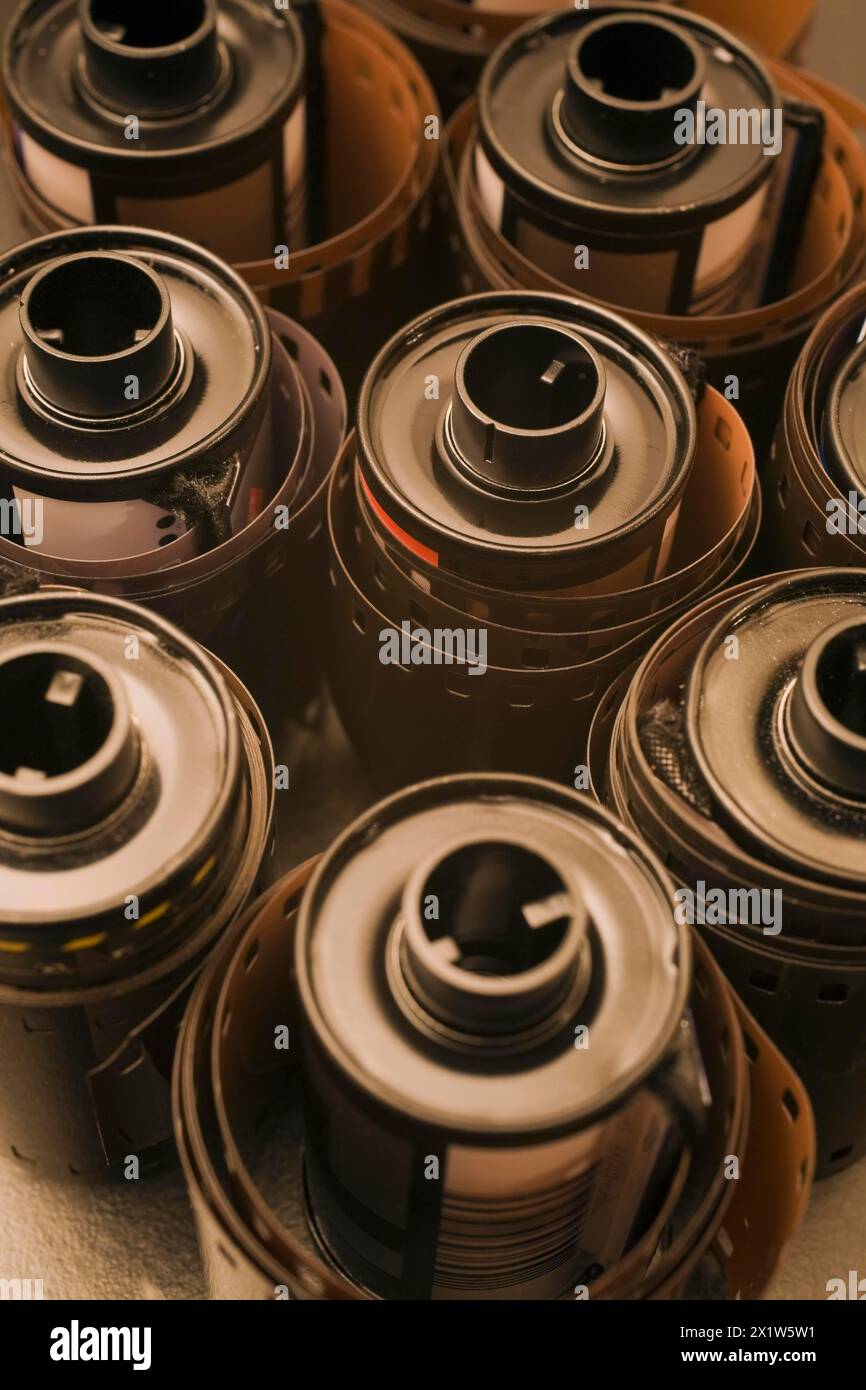 Close-up of unwound rolls of 35mm film cassettes, Studio Composition ...