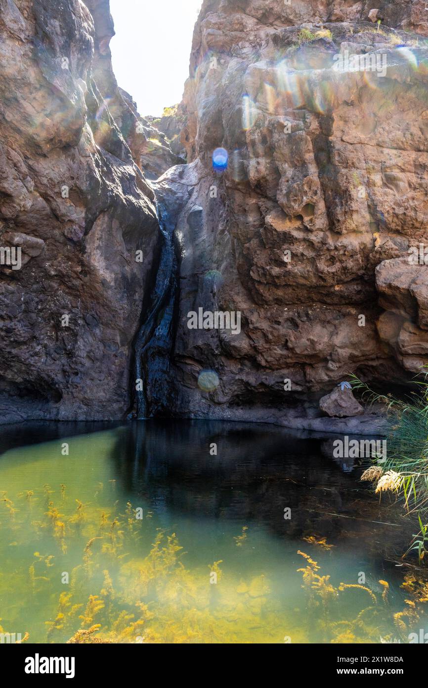 Beautiful waterfall at Charco Azul in El Podemos a Agaete on Gran Canaria, Canary Islands Stock Photo