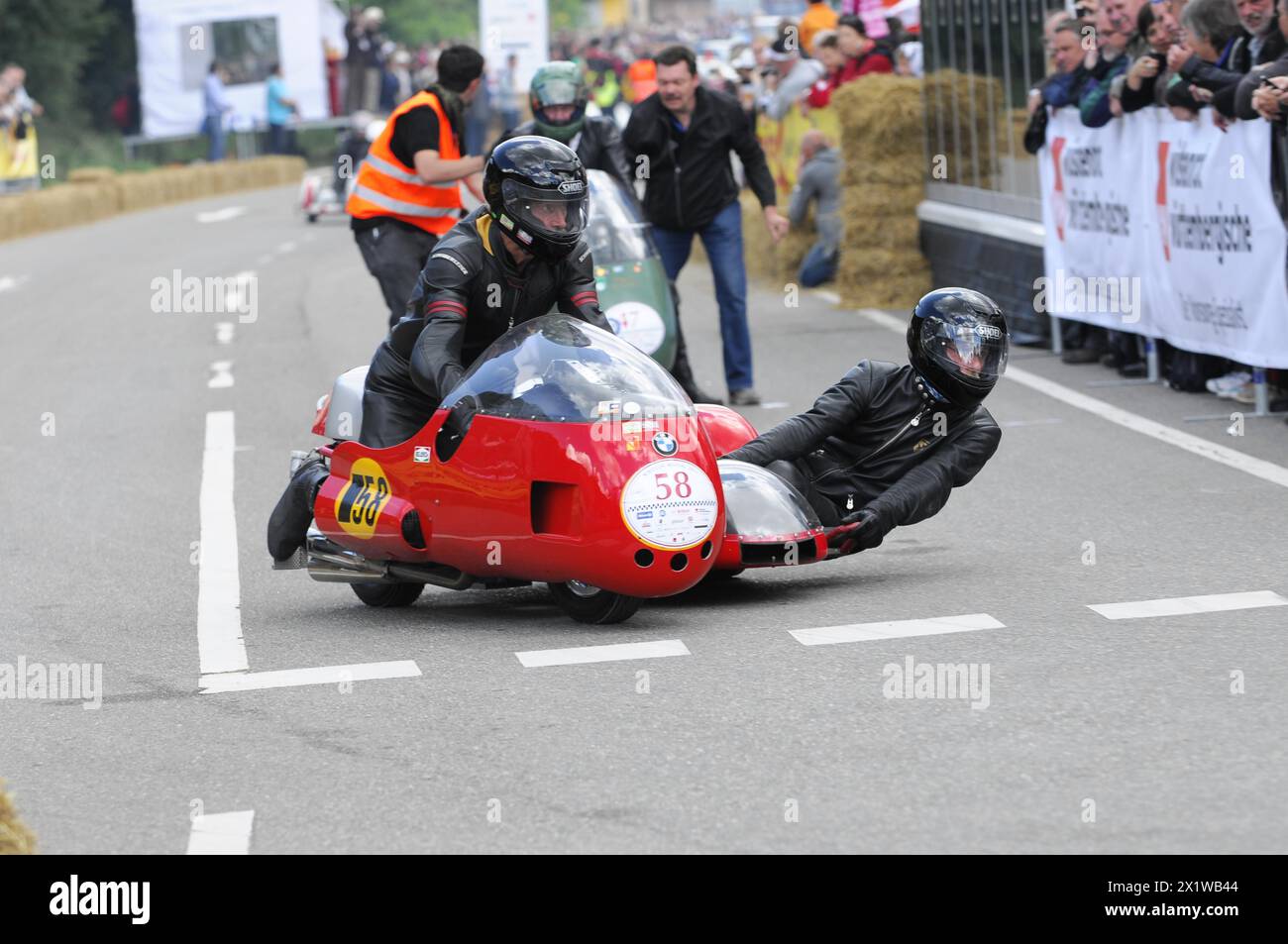 Motorbike with sidecar and focus on the racers in competition, SOLITUDE ...