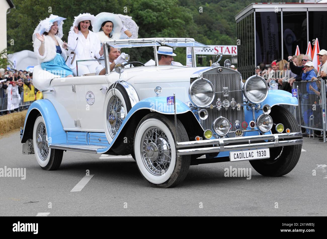 Cadillac Imperial Phaeton, built in 1930, A historic white Cadillac in a festive parade with passengers in costumes, SOLITUDE REVIVAL 2011 Stock Photo