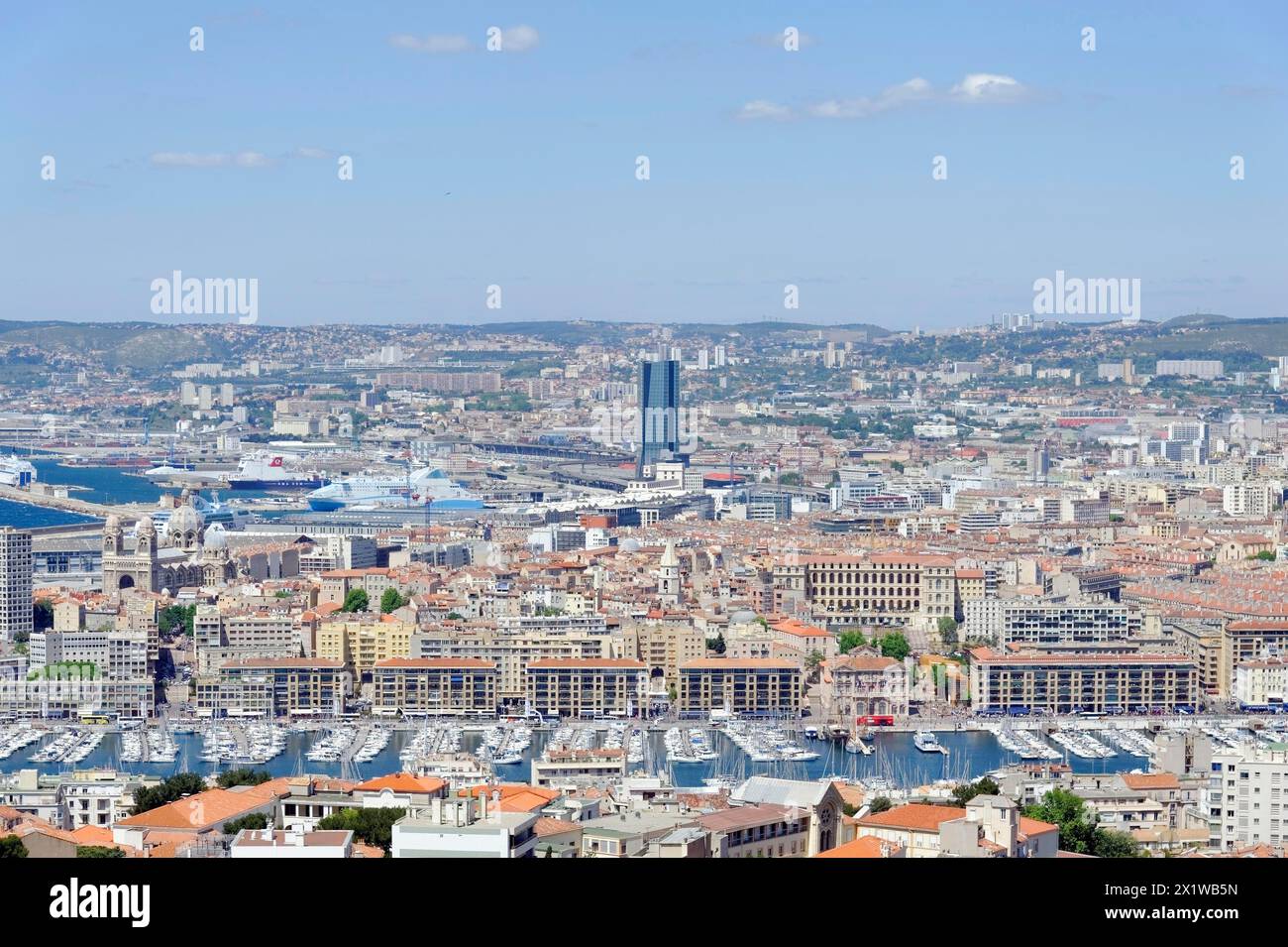 Aerial view of the harbour of Marseille, surrounded by urban development and the sea, Marseille, Departement Bouches-du-Rhone, Region Stock Photo