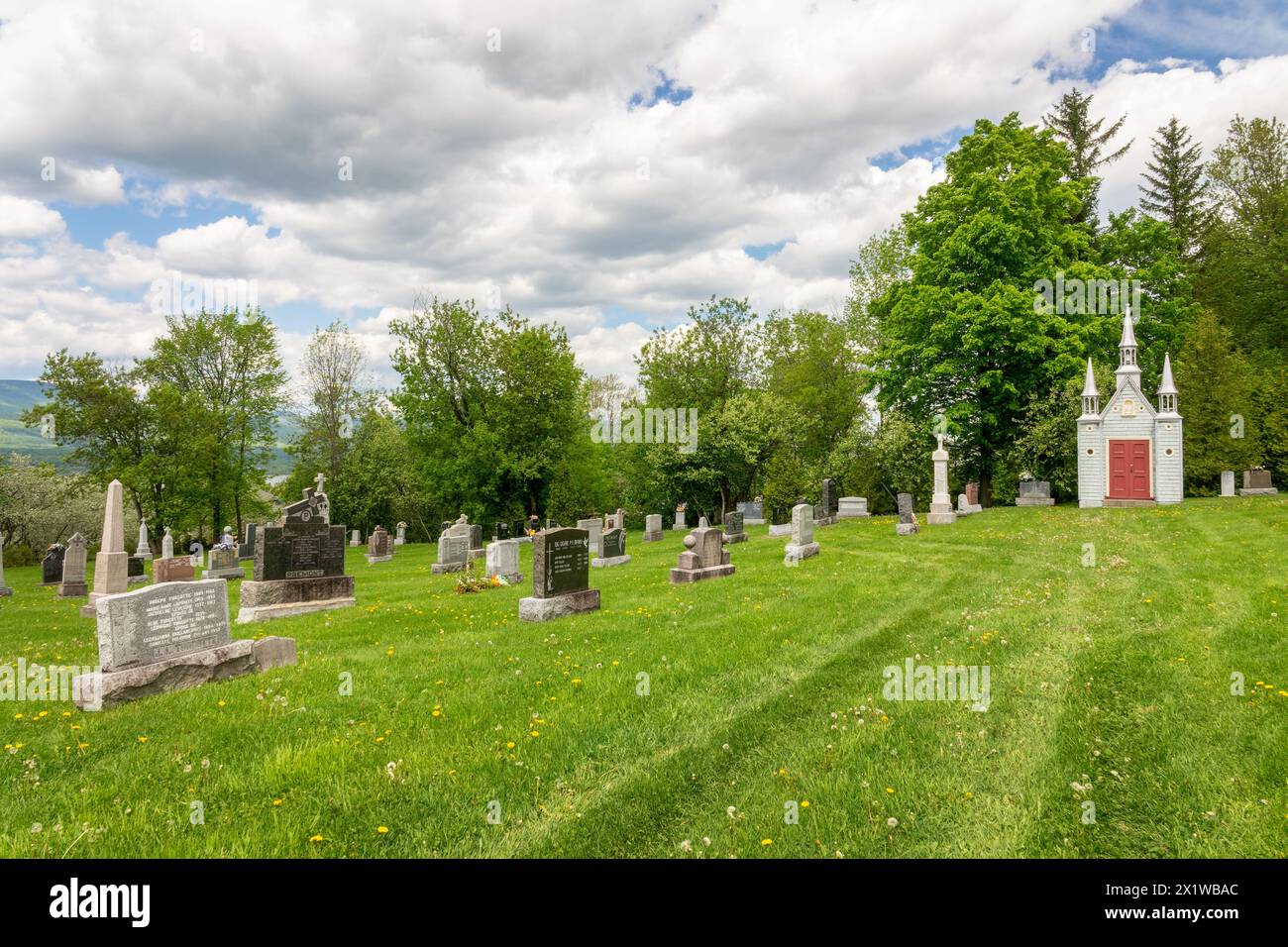 Dead house in the cemetery of the village of Sainte Famille on the island of Orleans near Quebec City, Canada Stock Photo