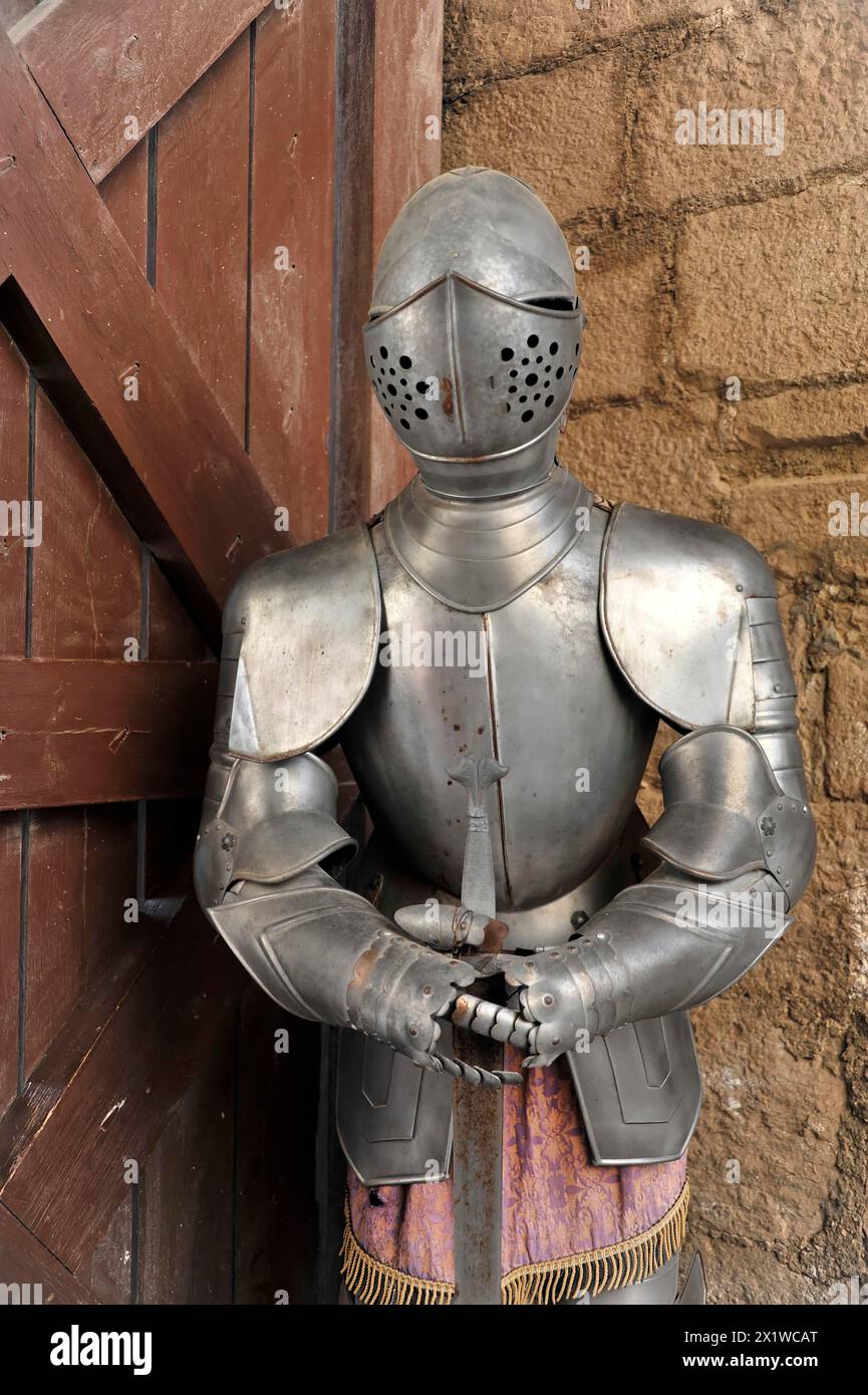 Knight's armour, modern talking doorman, Castillo de Santa Catalina, gothic castle in Jaen, medieval knight's armour completely presented on a Stock Photo