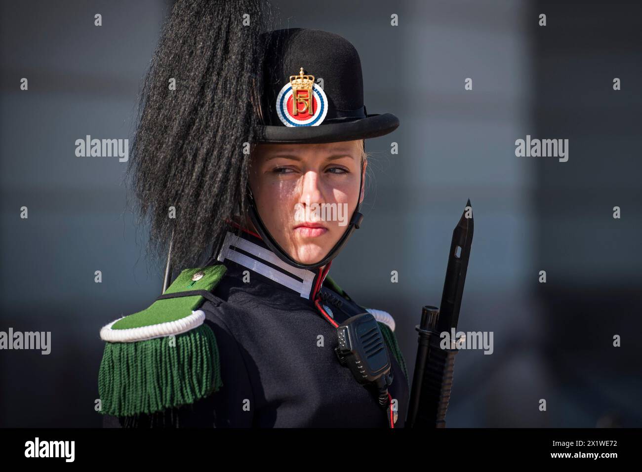 Female soldier with bayonet, Royal Guard, Royal Palace, Oslo, Norway Stock Photo