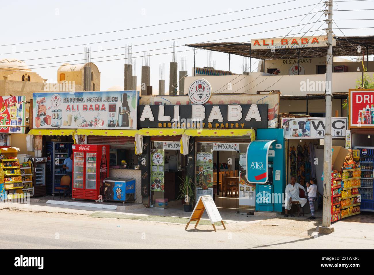 Ali Baba Restaurant, bakery roadside shop, opposite the Colossi of Memnon, Luxor, Egypt Stock Photo
