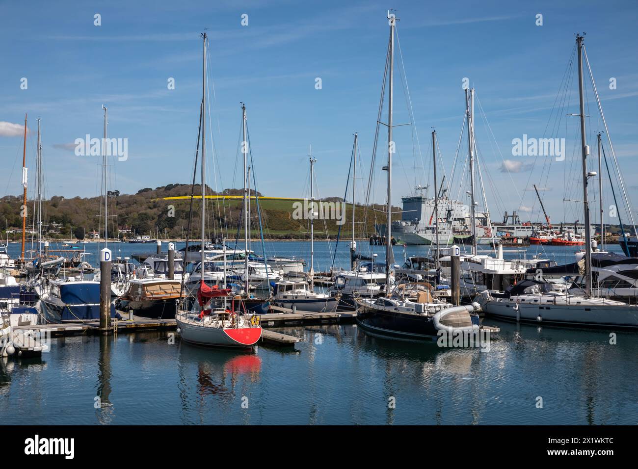 Falmouth, Cornwall, 18th April 2024, Many people were out enjoying all that Falmouth has to offer on a sunny spring Day in Cornwall, the temperature was 11C but felt much warmer. The sunshine makes a pleasant change from all the recent wet weather. RFA Mounts Bay was moored in the Harbour. Credit: Keith Larby/Alamy Live News Stock Photo