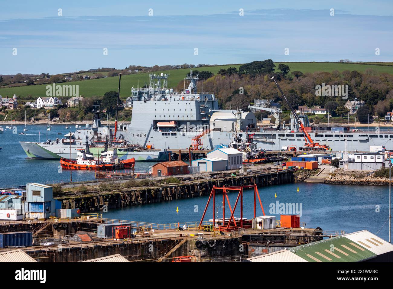 Falmouth, Cornwall, 18th April 2024, Many people were out enjoying all that Falmouth has to offer on a sunny spring Day in Cornwall, the temperature was 11C but felt much warmer. The sunshine makes a pleasant change from all the recent wet weather. RFA Mounts Bay was moored in the Harbour. Credit: Keith Larby/Alamy Live News Stock Photo