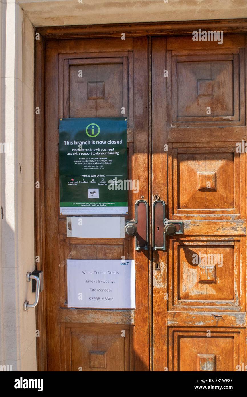 Notice on the door of Lloyds bank, explaining the closure of it's Sidmouth branch, the last bank in the small Devon town. Stock Photo