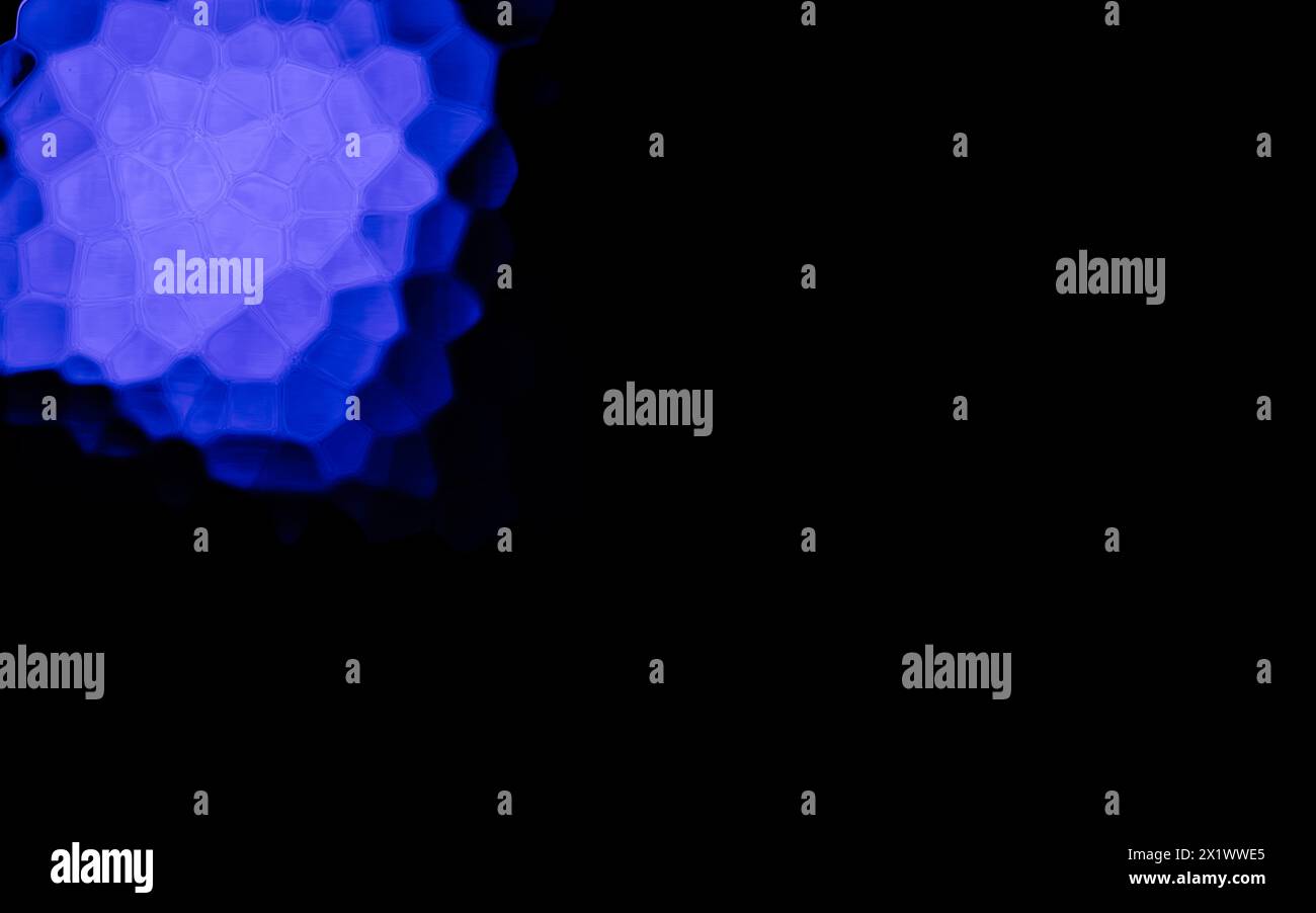 Blue Polygonal Shapes on black background. Honeycomb pattern. Stock Photo