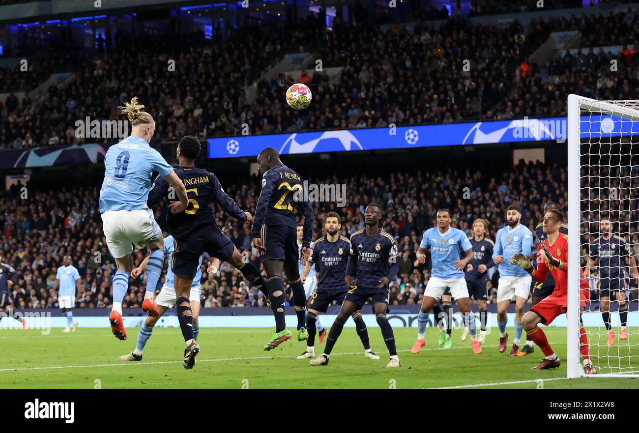 Etihad Stadium, Manchester, UK. 17th Apr, 2024. Champions League Football, Quarter Final, Manchester City versus Real Madrid; Erling Haaland of Manchester City heads at goal Credit: Action Plus Sports/Alamy Live News Stock Photo