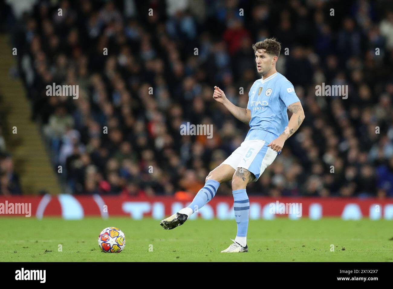 Etihad Stadium, Manchester, UK. 17th Apr, 2024. Champions League Football, Quarter Final, Manchester City versus Real Madrid; John Stones of Manchester City passes the ball Credit: Action Plus Sports/Alamy Live News Stock Photo