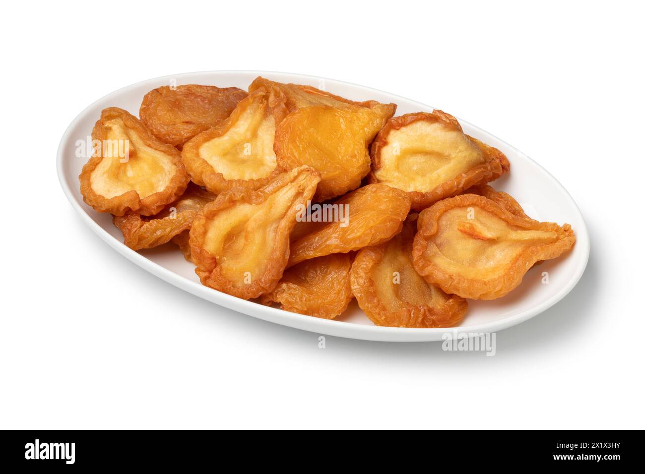 Plate with dried pear fruit close up isolated on white background Stock Photo