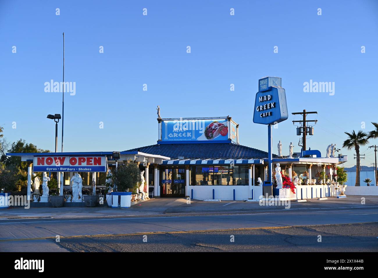 BAKER, CALIFORNIA - 14 APR 2024: The Mad Greek Cafe on Baker Raod in the High Desert town on the route to Death Valley. Stock Photo