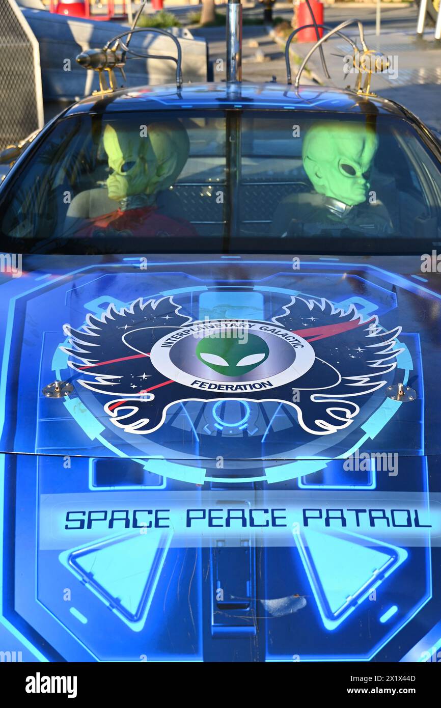BAKER, CALIFORNIA - 14 APR 2024: Space Peace Patrol car with Aliens at the Alien Fresh Jerky Store. Stock Photo