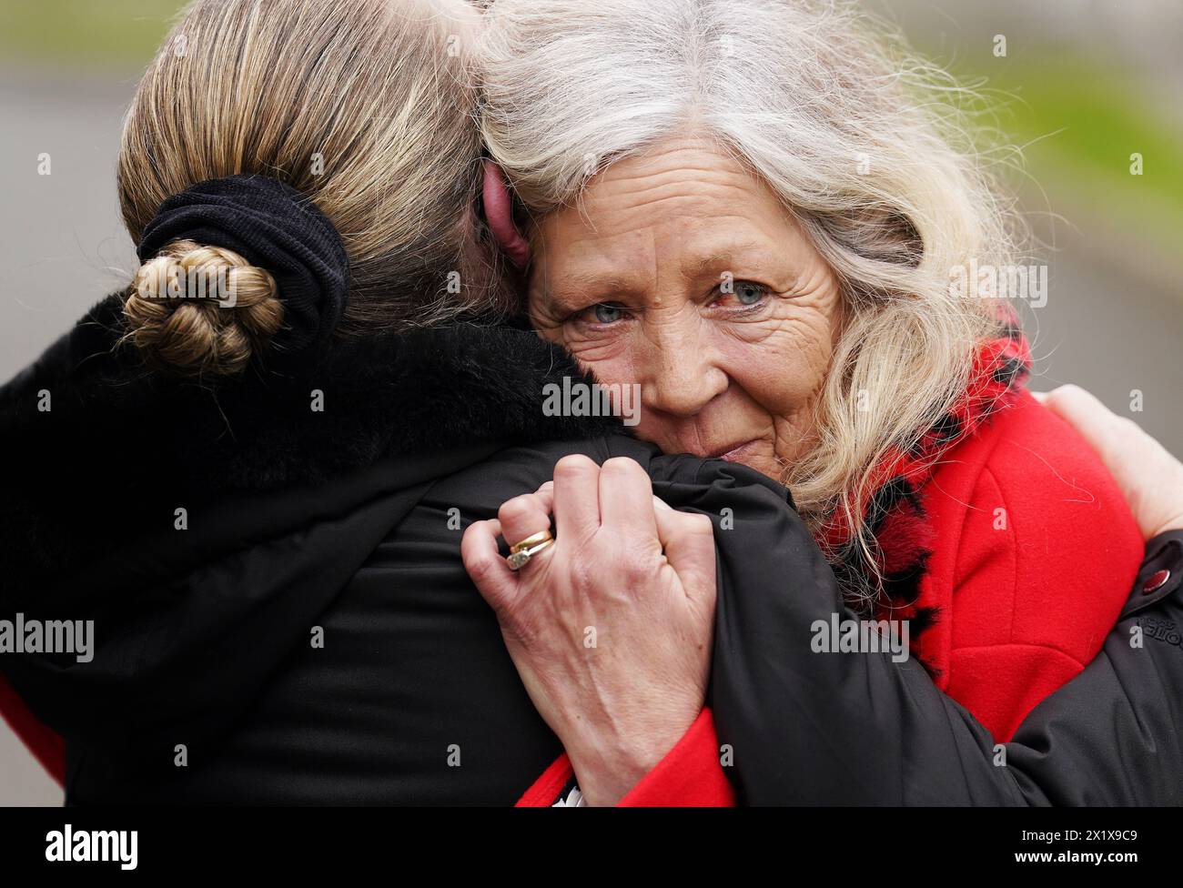 Stardust survivor Antoinette Keegan (right) and her sister Lorraine, who lost their sisters Mary and Martina, embrace outside Dublin Coroner's Court after a verdict of unlawful killing has been returned by the jury in the Stardust fire inquests for all 48 people who died in the Dublin nightclub disaster in the early hours of Valentine's Day in 1981, the worst fire disaster in the history of the Irish state. The inquests, which are the longest held in Ireland, began in April last year and have heard evidence from 373 people. Picture date: Thursday April 18, 2024. Stock Photo