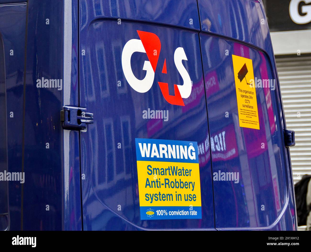 London, England, UK - 28 June 2023: Close up view of the signs on the back of a G4S security van stopped in central London Stock Photo