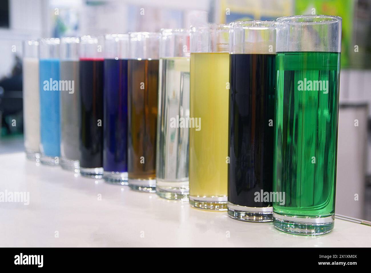 Multi-colored liquid in test tubes on a stand stand. Industry Stock Photo