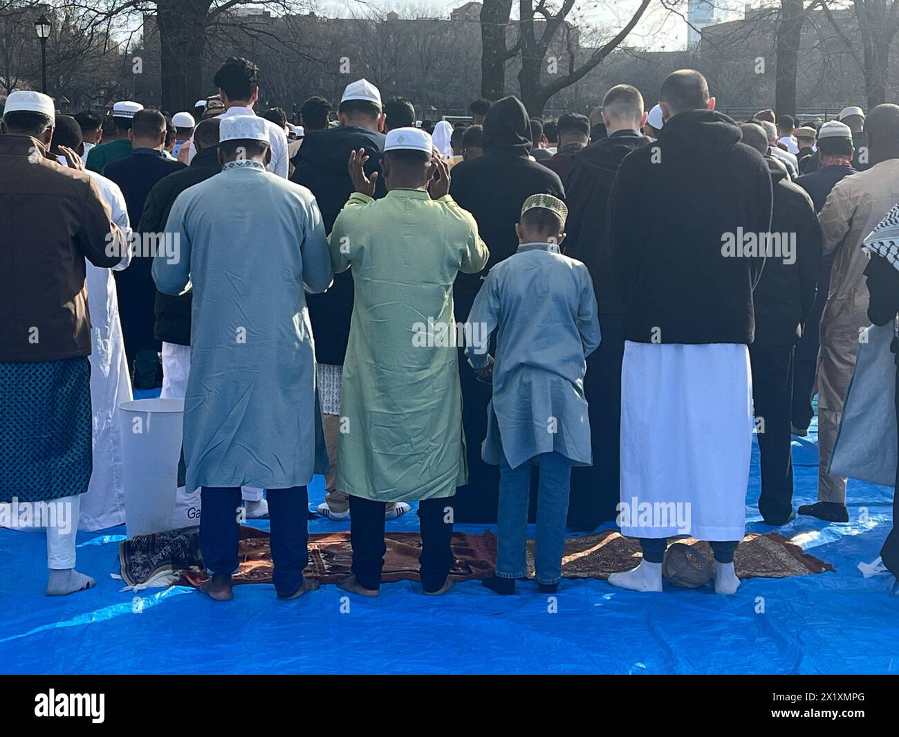 Muslims come together for Prayer at the Parade Grounds by Prospect Park after the month of Ramadan on Eid al-Fitr in Brooklyn, New York. Stock Photo