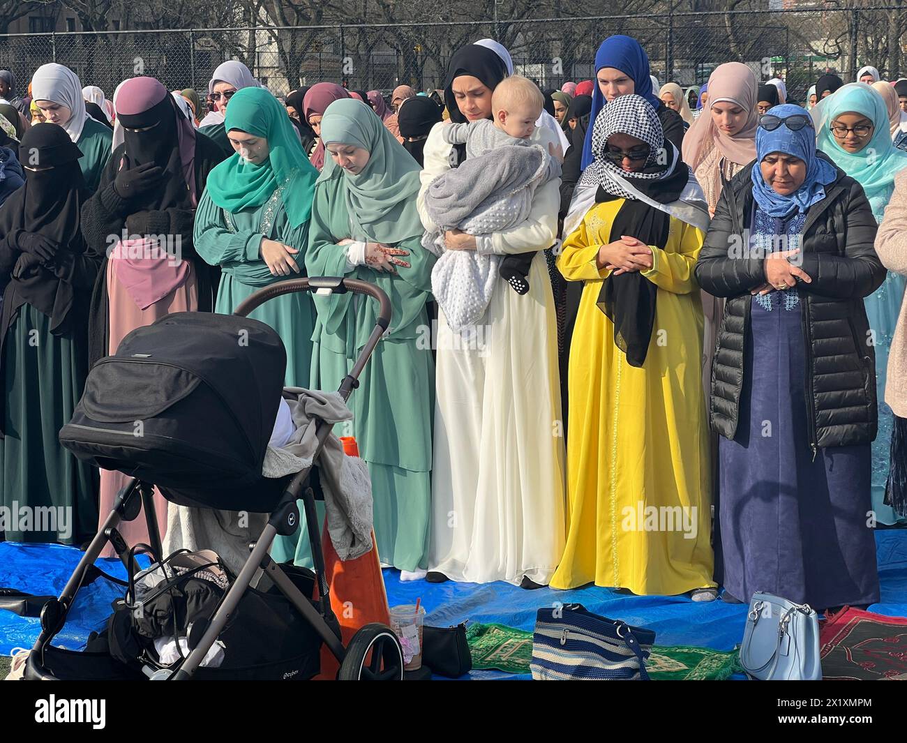 Muslims come together for Prayer at the Parade Grounds by Prospect Park after the month of Ramadan on Eid al-Fitr in Brooklyn, New York. Stock Photo