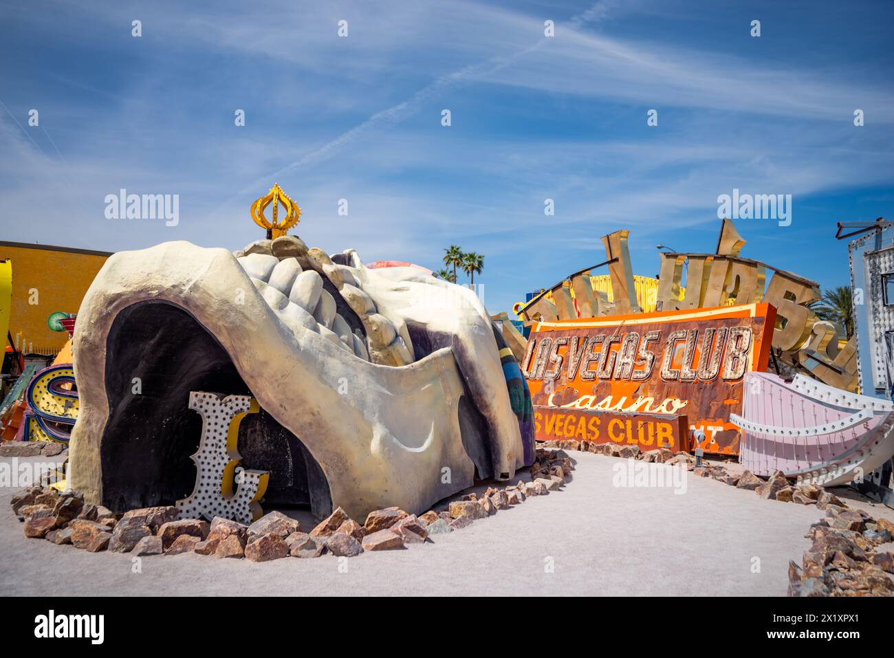 Abandoned and discarded skull sculpture among other abandoned signs in the Neon Museum aka Neon boneyard in Las Vegas, Nevada. Stock Photo
