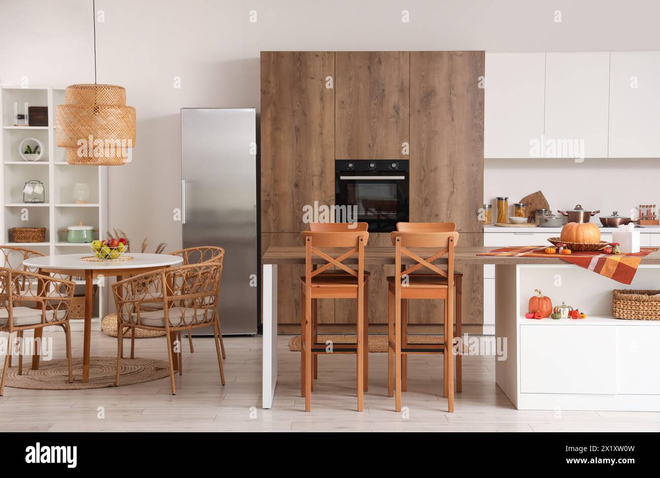 Interior of modern kitchen with tables and built-in oven Stock Photo ...