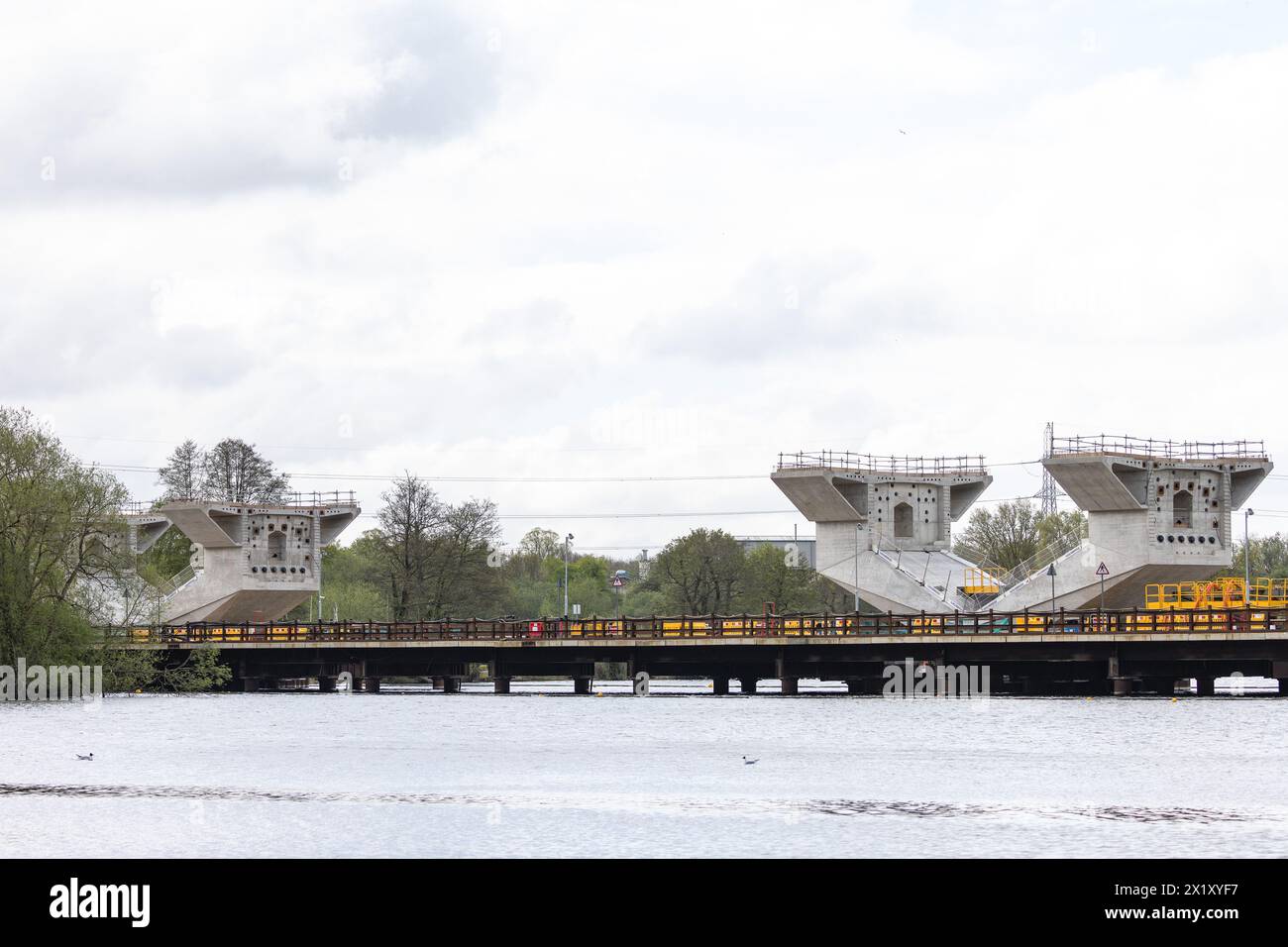 London, UK. 16th April, 2024. Segments of the Colne Valley viaduct for the HS2 high-speed rail link are pictured above Harefield Lake No. 2. The viaduct will carry HS2 across lakes and watercourses in the Colne Valley Regional Park. Credit: Mark Kerrison/Alamy Live News Stock Photo