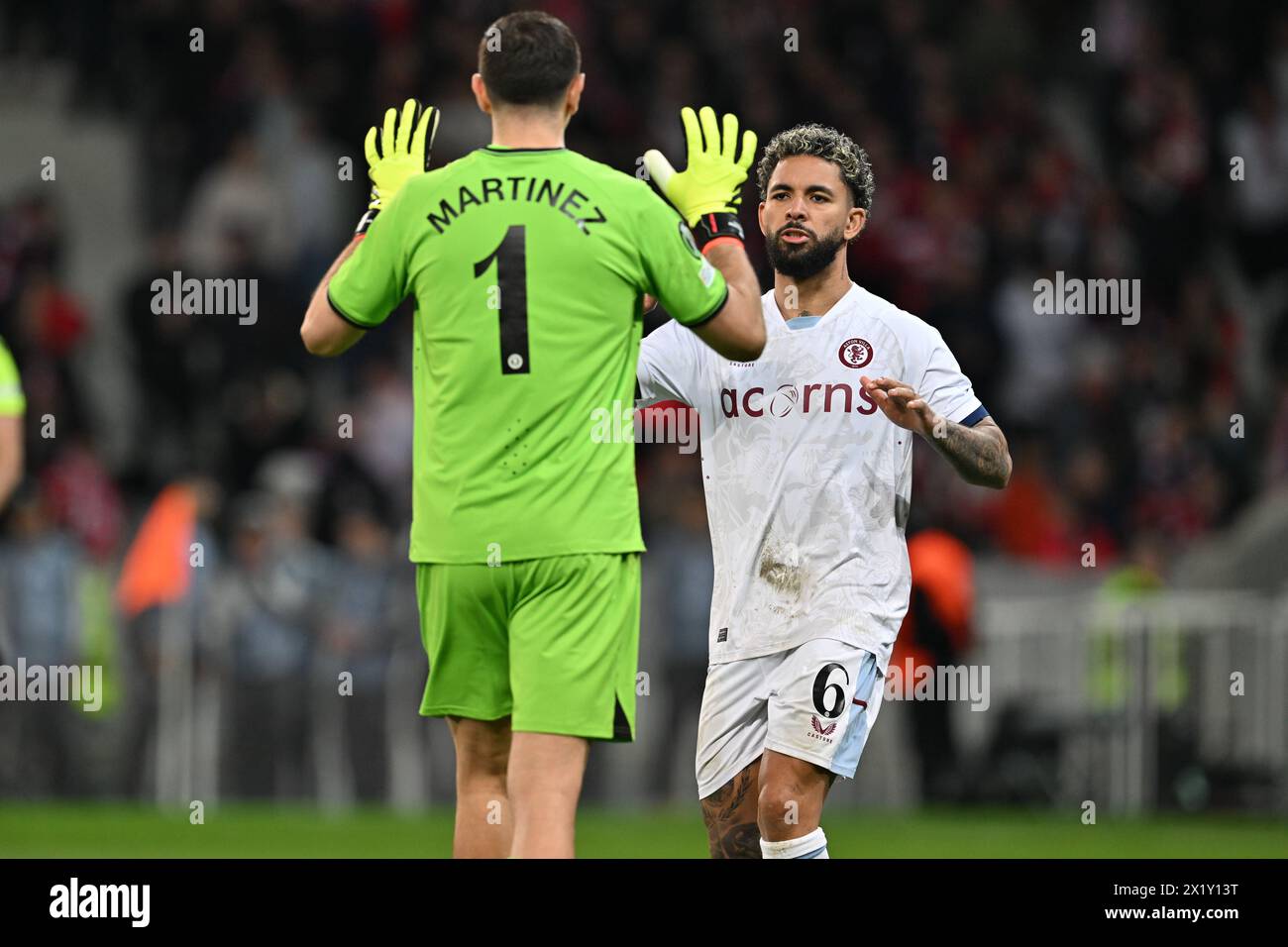 Lille, France. 18th Apr, 2024. Douglas Luiz (6) of Aston Villa and goalkeeper Emiliano Martinez (1) of Aston Villa pictured during the Uefa Conference League Quarter final round - second leg game in the 2023-2024 season between Lille OSC and Aston Villa on April 18, 2024 in Lille, France. (Photo by David Catry/Isosport) Credit: sportpix/Alamy Live News Stock Photo