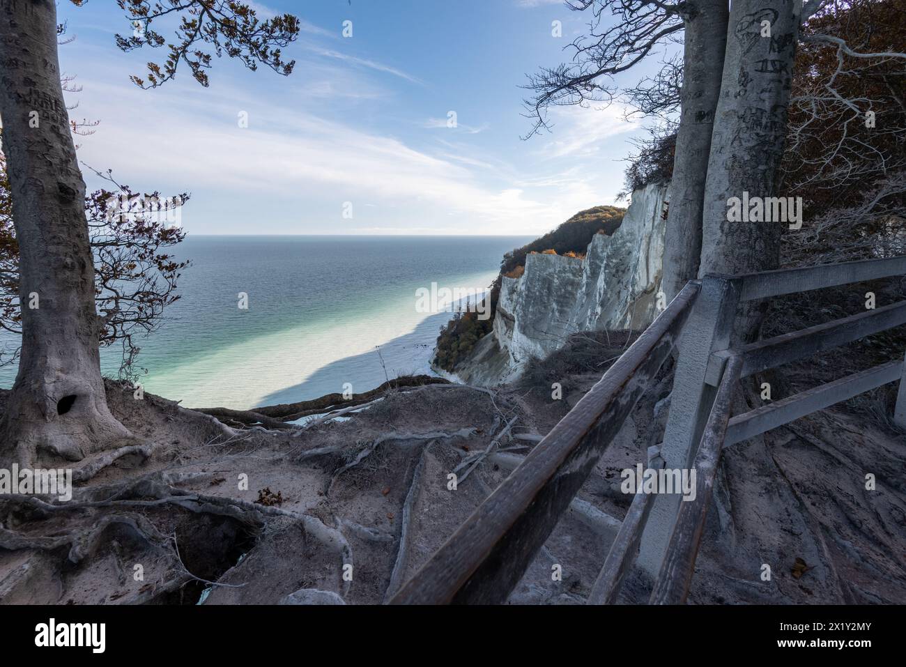Steep coast of Møns Klint, chalk cliffs, white water of the Baltic Sea through washed-out chalk after storm surge, Mön Island, Denmark Stock Photo