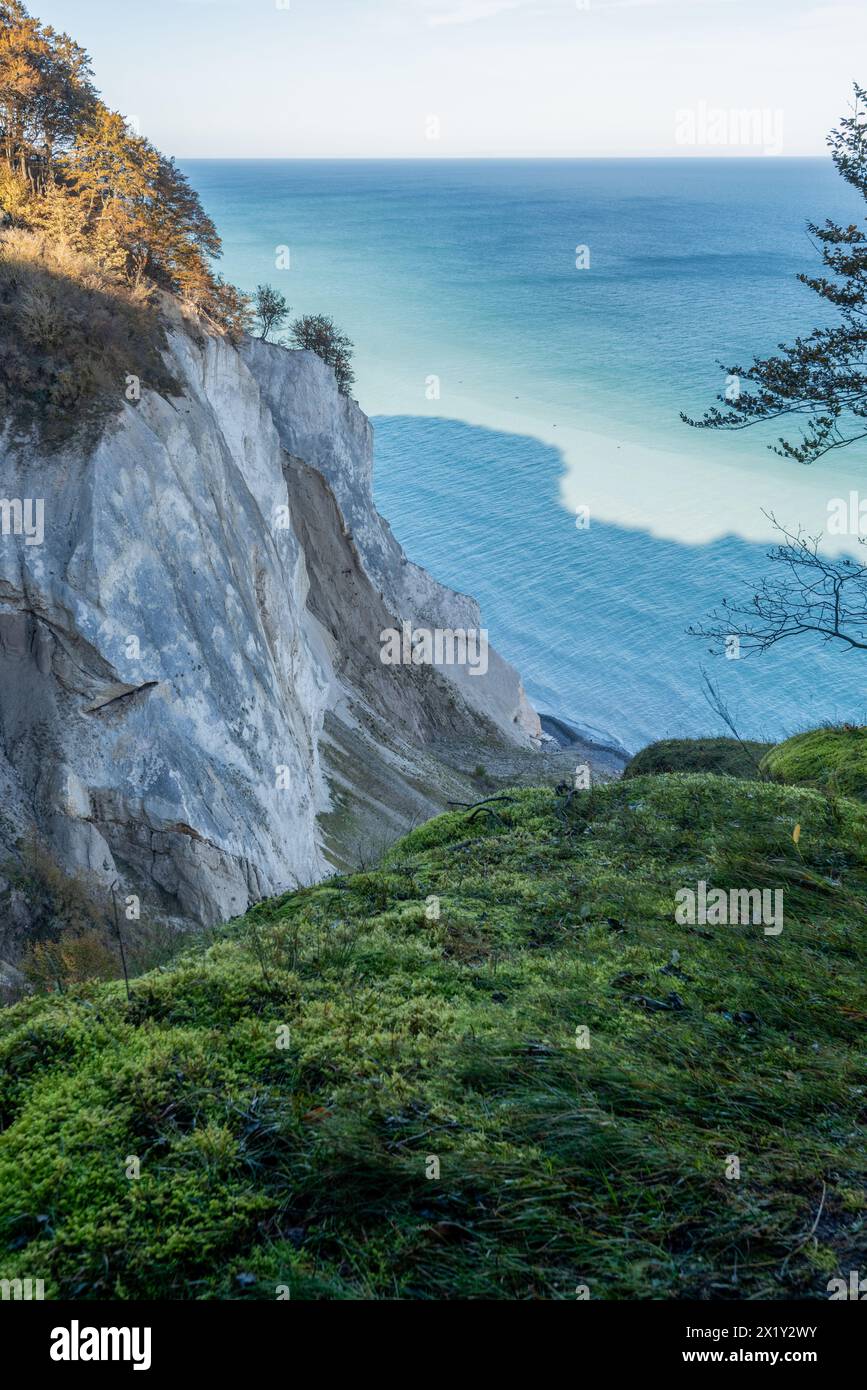 Steep coast of Møns Klint, chalk cliffs, white water of the Baltic Sea through washed-out chalk after storm surge, Mön Island, Denmark Stock Photo
