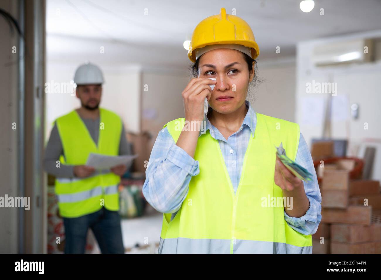 Crying female builder construction hi-res stock photography and images ...