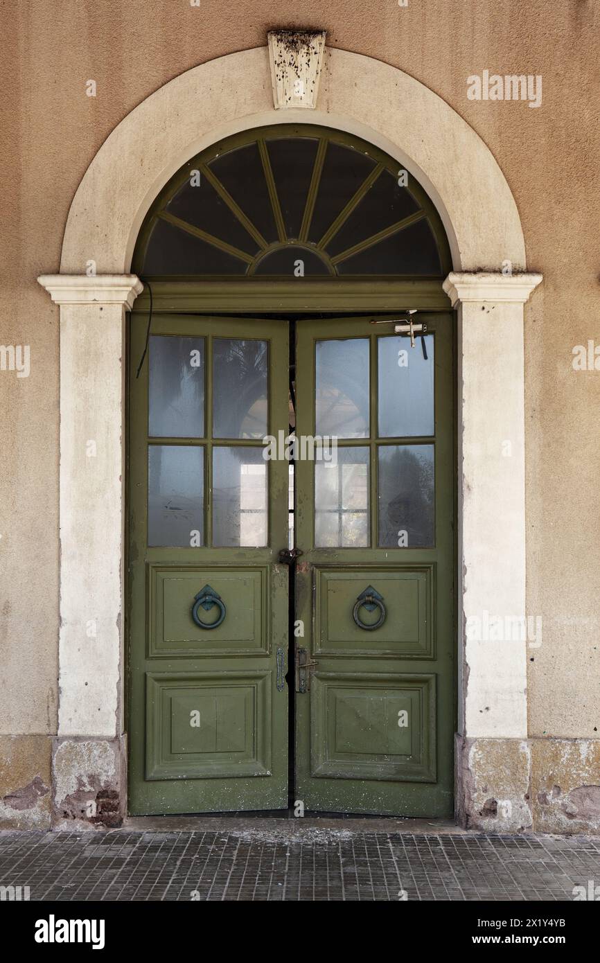 Vintage doors of a an old train station Stock Photo - Alamy