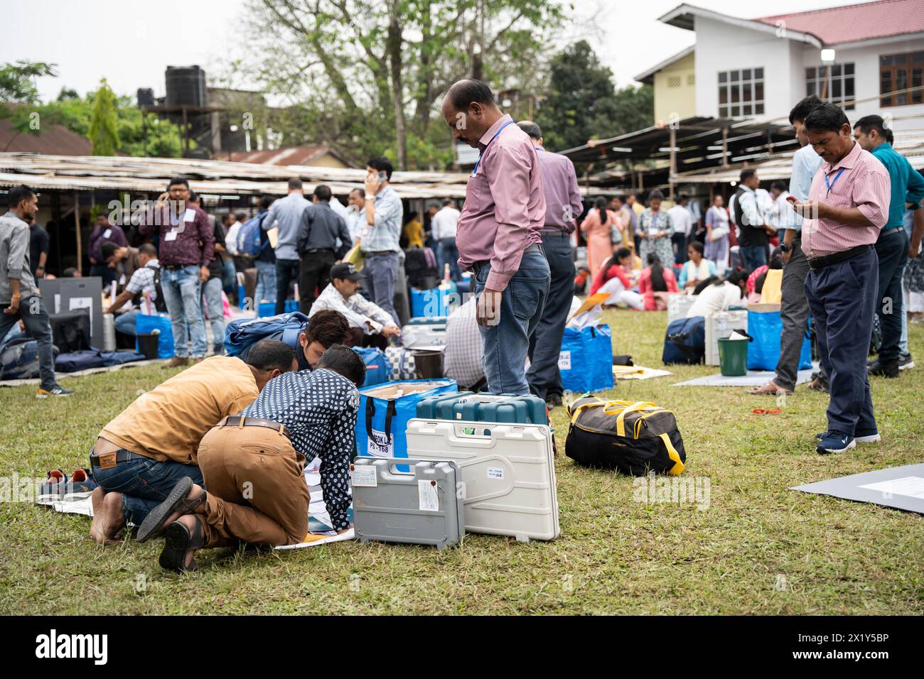 April 18, 2024: JORHAT, INDIA - APRIL 18: Election officials make preparations after collecting Electronic Voting Machines (EVMs) from a polling materials distribution centre on the eve of 1st phase of Lok Sabha Election on April 18, 2024 in Jorhat, Assam, India. Nearly a billion Indians will vote to elect a new government in six-week-long parliamentary polls starting on April 19. (Credit Image: © David Talukdar/ZUMA Press Wire) EDITORIAL USAGE ONLY! Not for Commercial USAGE! Stock Photo