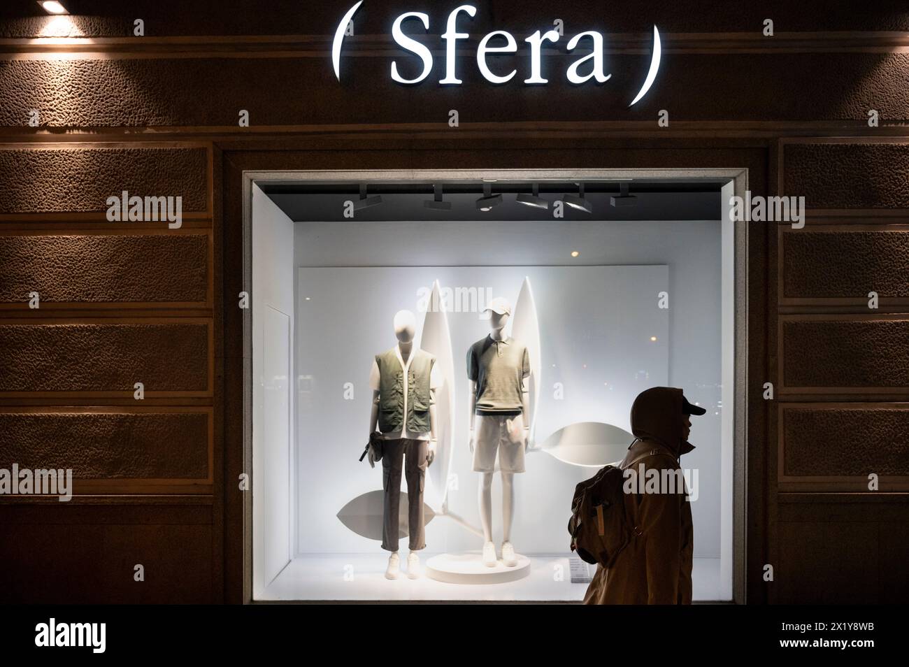 Madrid, Spain. 18th Apr, 2024. A pedestrian walks past the Spanish