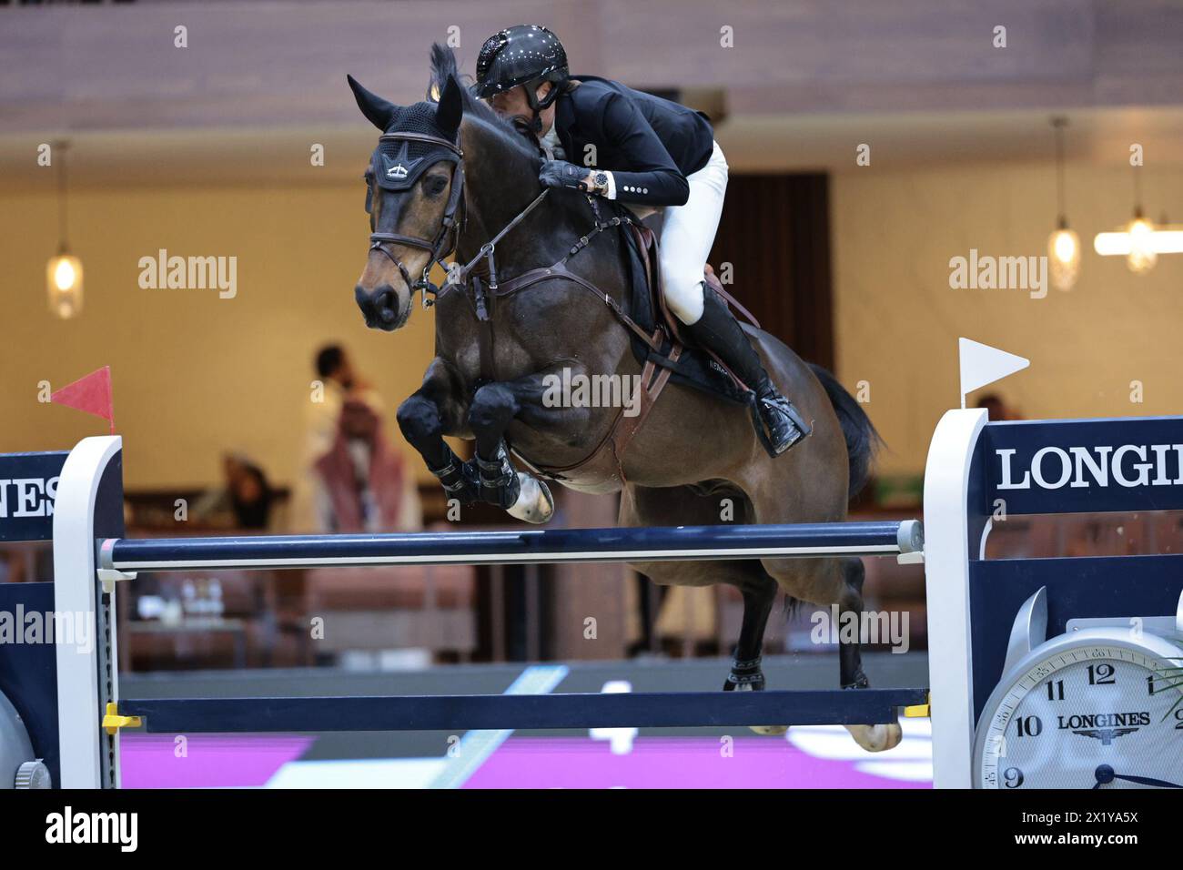 Martin Fuchs of Switzerland with Commissar Pezi during the Longines FEI Jumping World Cup™ - Final II at the FEI World Cup™ Finals Riyadh on April 18, 2024, Riyadh International Convention and Exhibition Center, Kingdom of Saudi Arabia (Photo by Maxime David - MXIMD Pictures) Stock Photo