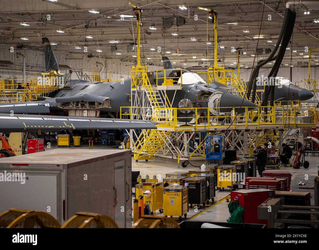 TINKER AIR FORCE BASE, Okla. — B-1 aircraft undergo programmed depot maintenance at the Oklahoma City Air Logistics Complex at Tinker Air Force Base, Oklahoma, Dec. 4, 2022. Normally upgrades such as the announced B-1 Embracing Agile Scheduling Team upgrade are performed when the aircraft returns for its scheduled maintenance cycle, but BEAST is being completed out of cycle to improve the aircraft’s lethality sooner. (U.S. Air Force photo by Carter Denton) Stock Photo