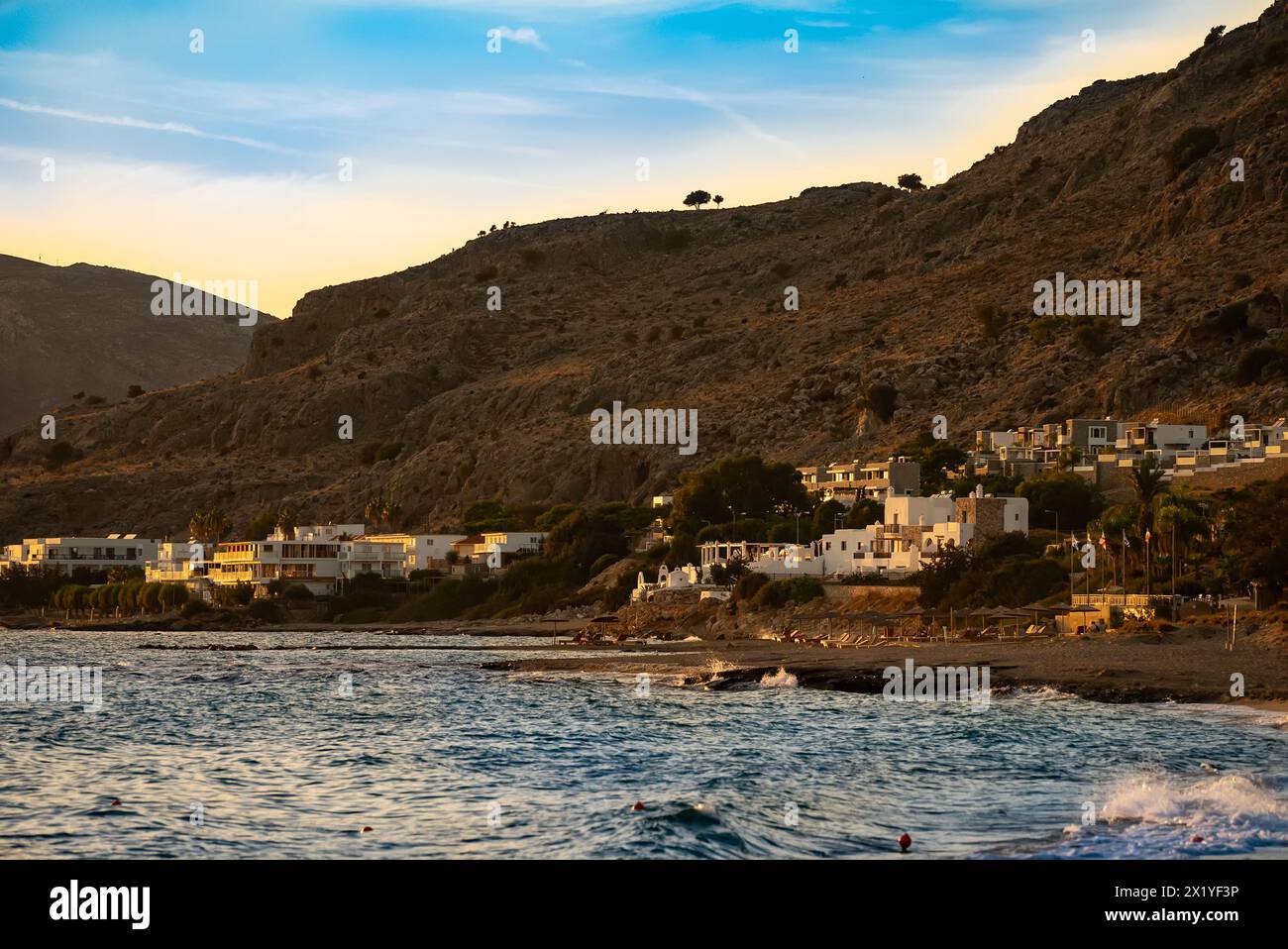 Pefki beach with houses on the island of Rhodes Stock Photo - Alamy
