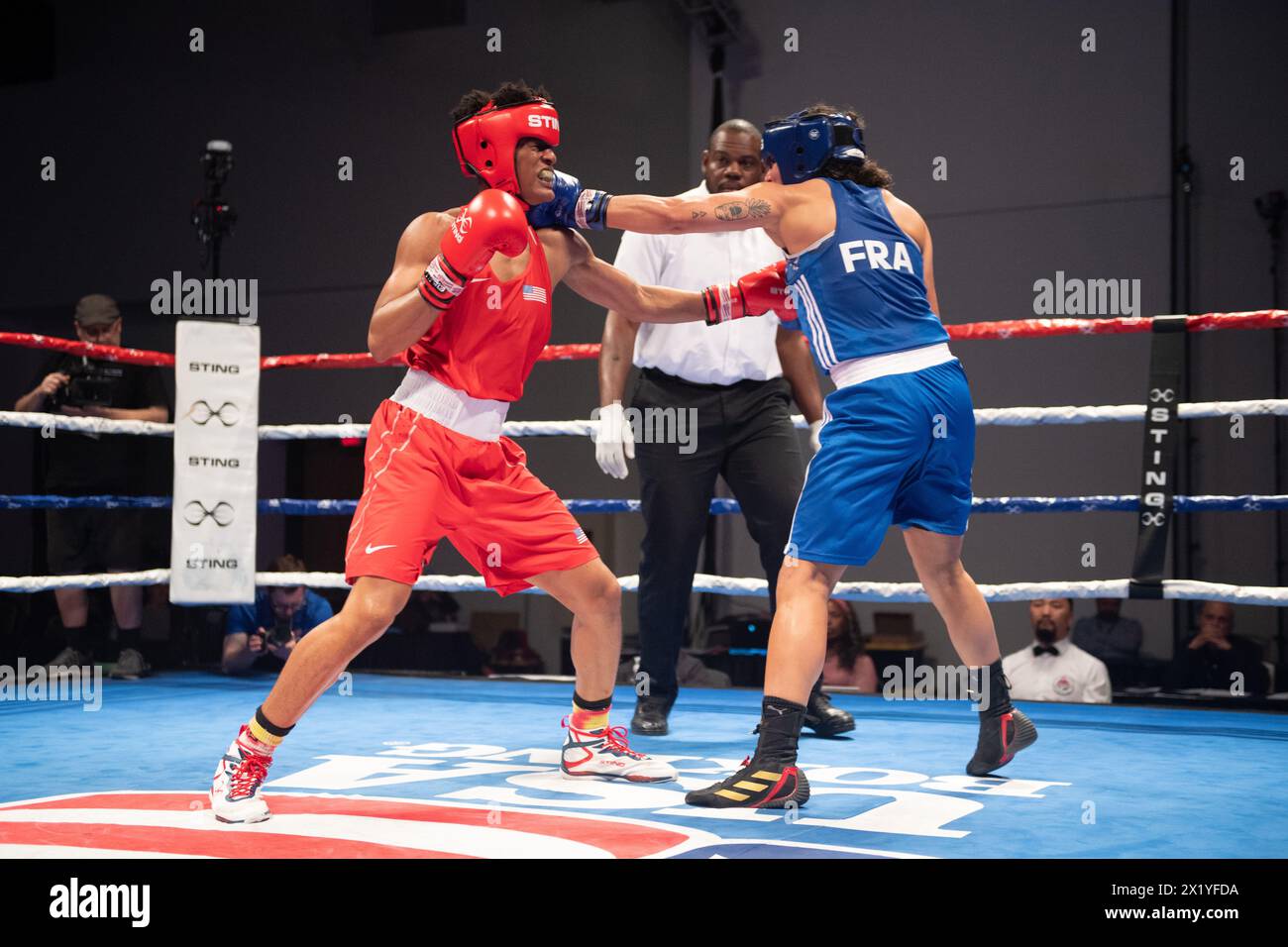 Pueblo, Colorado, USA. 18th Apr, 2024. Emilie Sonvico of France(Blue) trades punches with Stacia Suttles of the United States(Red), before winning their women's second round 66 kg match. Credit: Casey B. Gibson/Alamy Live News Stock Photo
