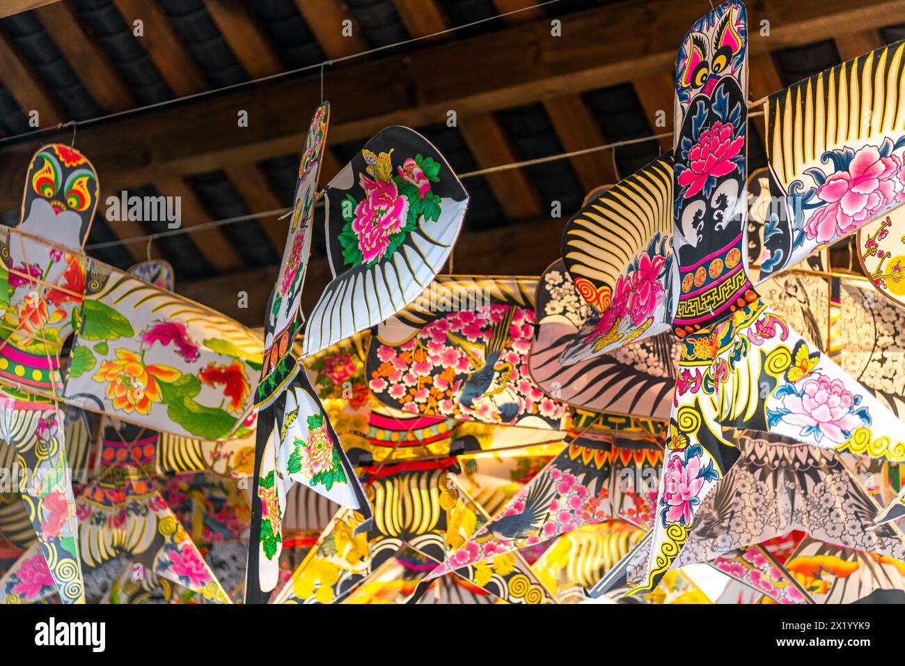 Chinese kites of different style in Ciqikou Old Town, Chongqing, China. Background Stock Photo
