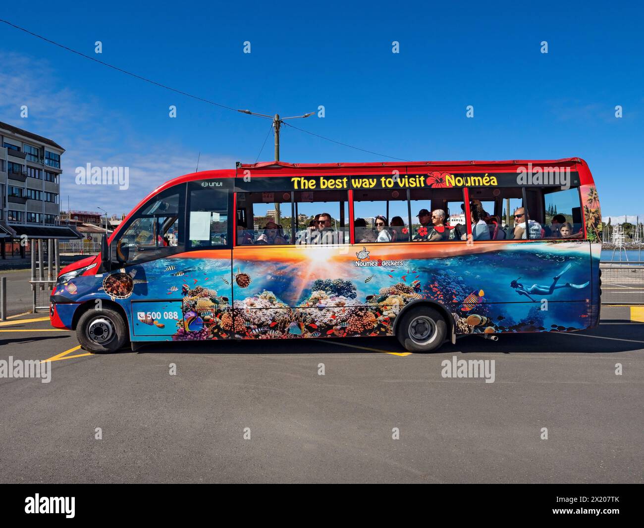 South Pacific Cruise /  A Noumea 2 Deckers sightseeing bus waits for Cruise Ship passingers in  Noumea, New Caledonia. Stock Photo