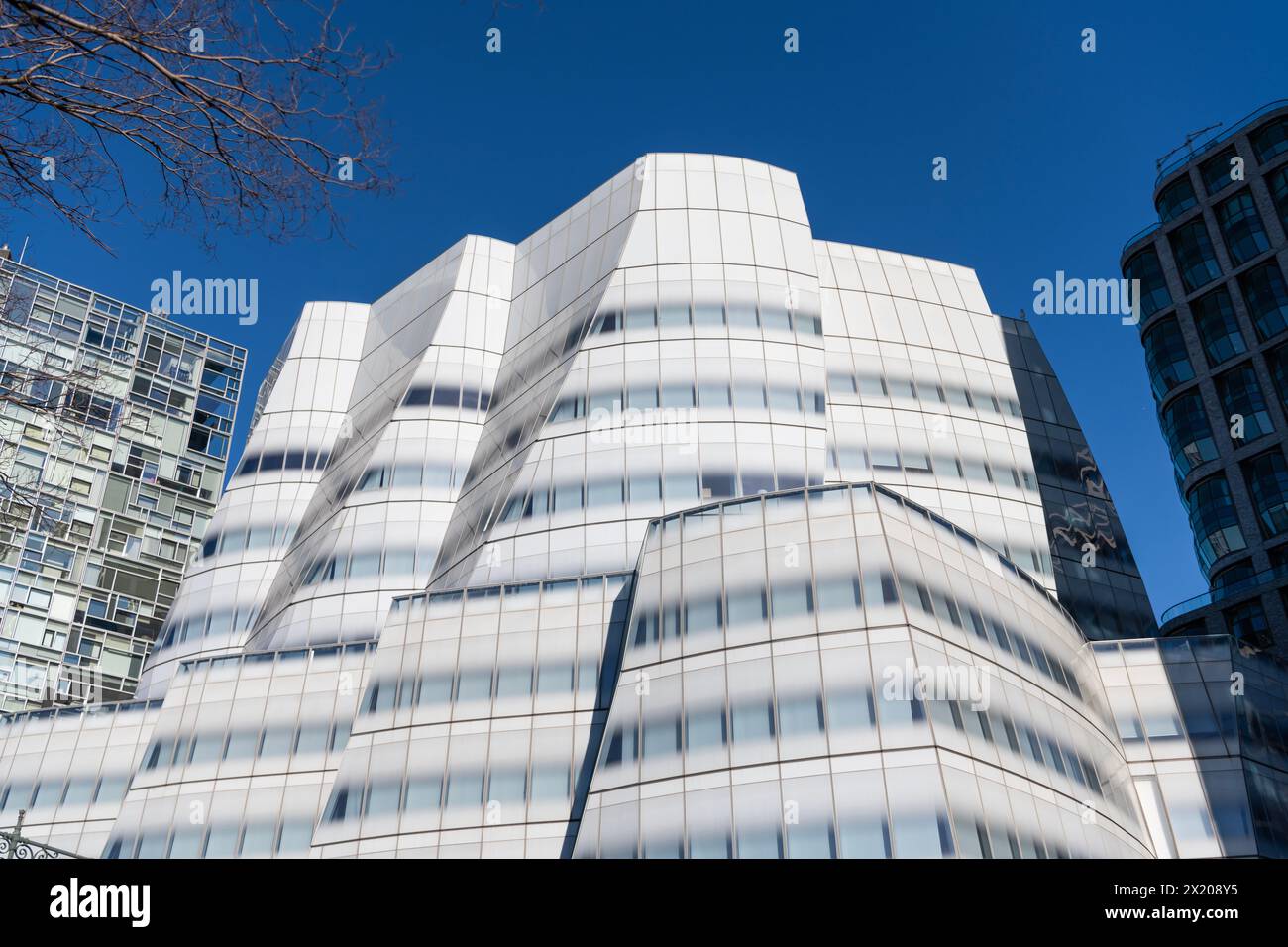 Geometrical structural building. Geometric architecture in modern city. Architectural structure. Geometric shapes on modern building. Geometric struct Stock Photo