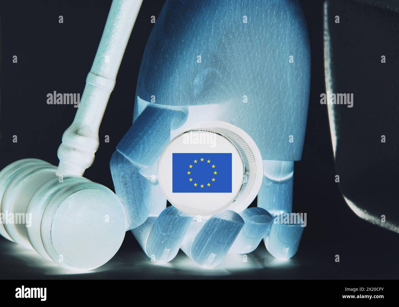 Flag of European Union with Gavel and robot hand . Symbolizing the potential regulation of AI from Eu parliament. Stock Photo