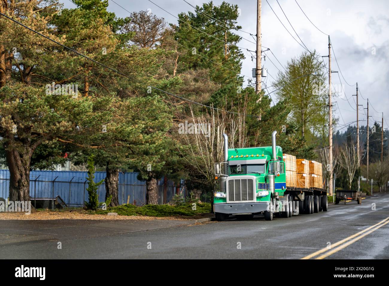 Industrial carrier green classic big rig semi-truck tractor with ...