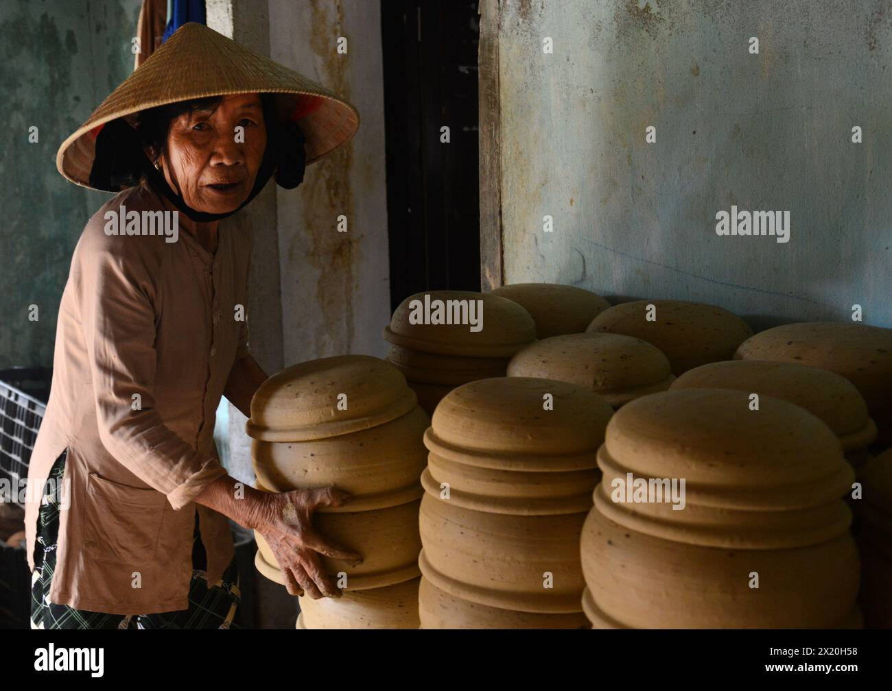 Traditional Clay pots production at Thanh Ha pottery village in Hoi An — free download