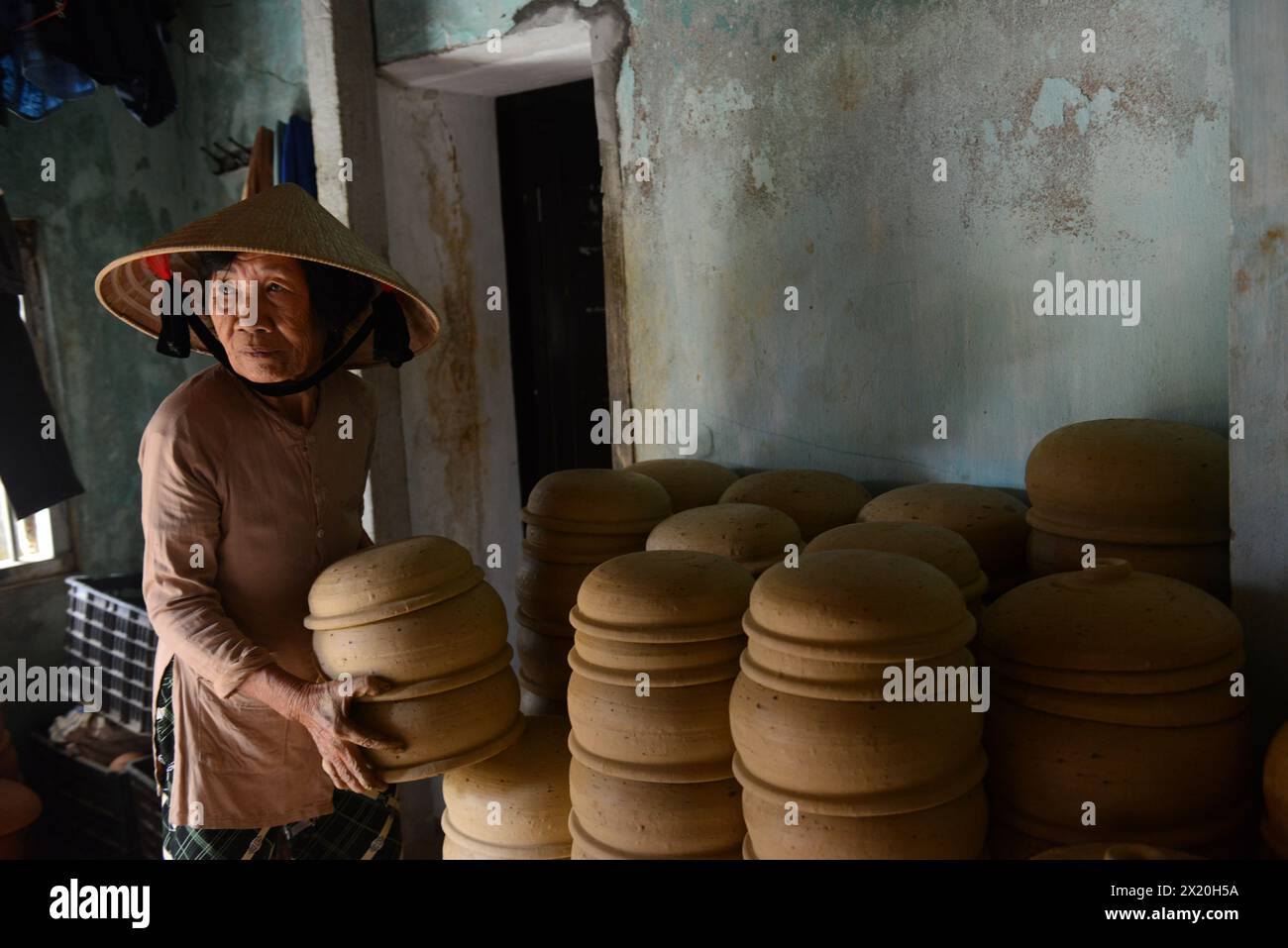 Traditional Clay pots production at Thanh Ha pottery village in Hoi An — free download