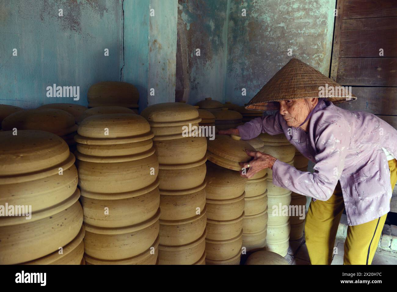 Traditional Clay pots production at Thanh Ha pottery village in Hoi An — free download