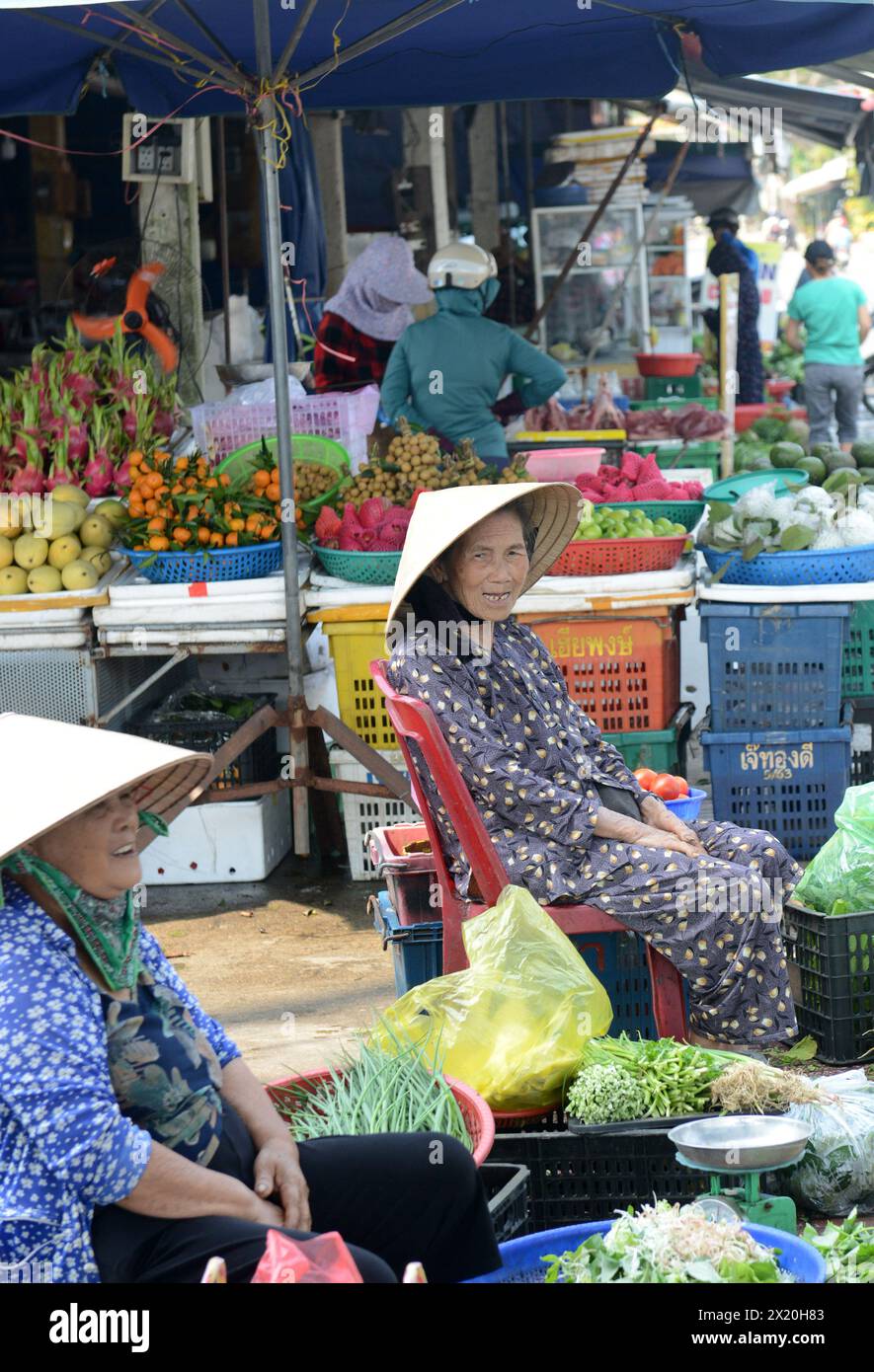 Portrait of an elderly Vietnamese woman taken at a local market in Hội An, Vietnam. Stock Photo